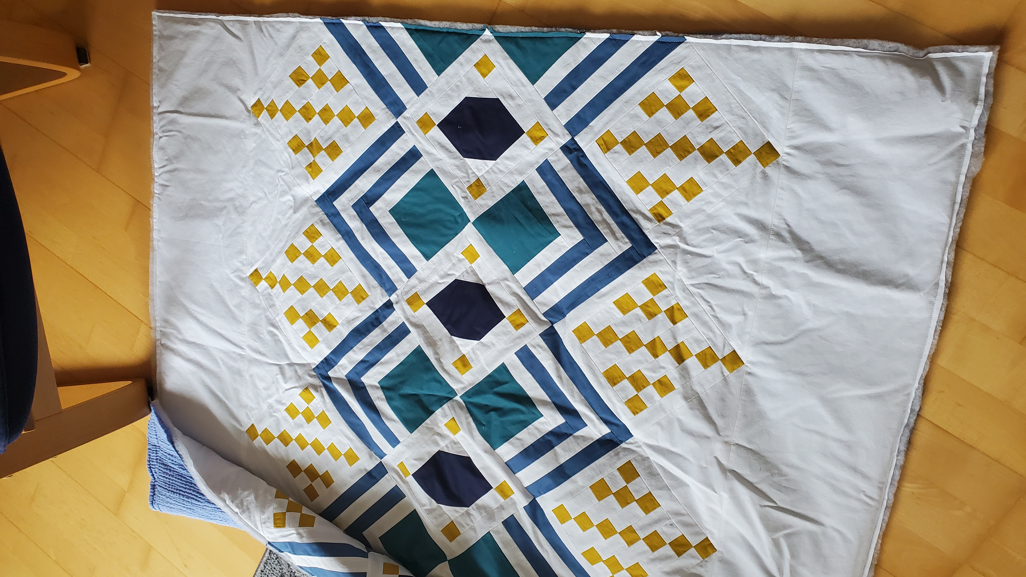 Art Deco quilt — teal, navy & gold